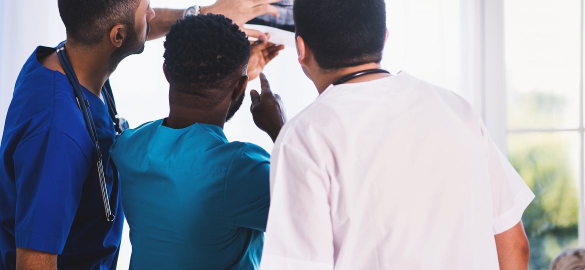 Doctors looking at X-ray Image