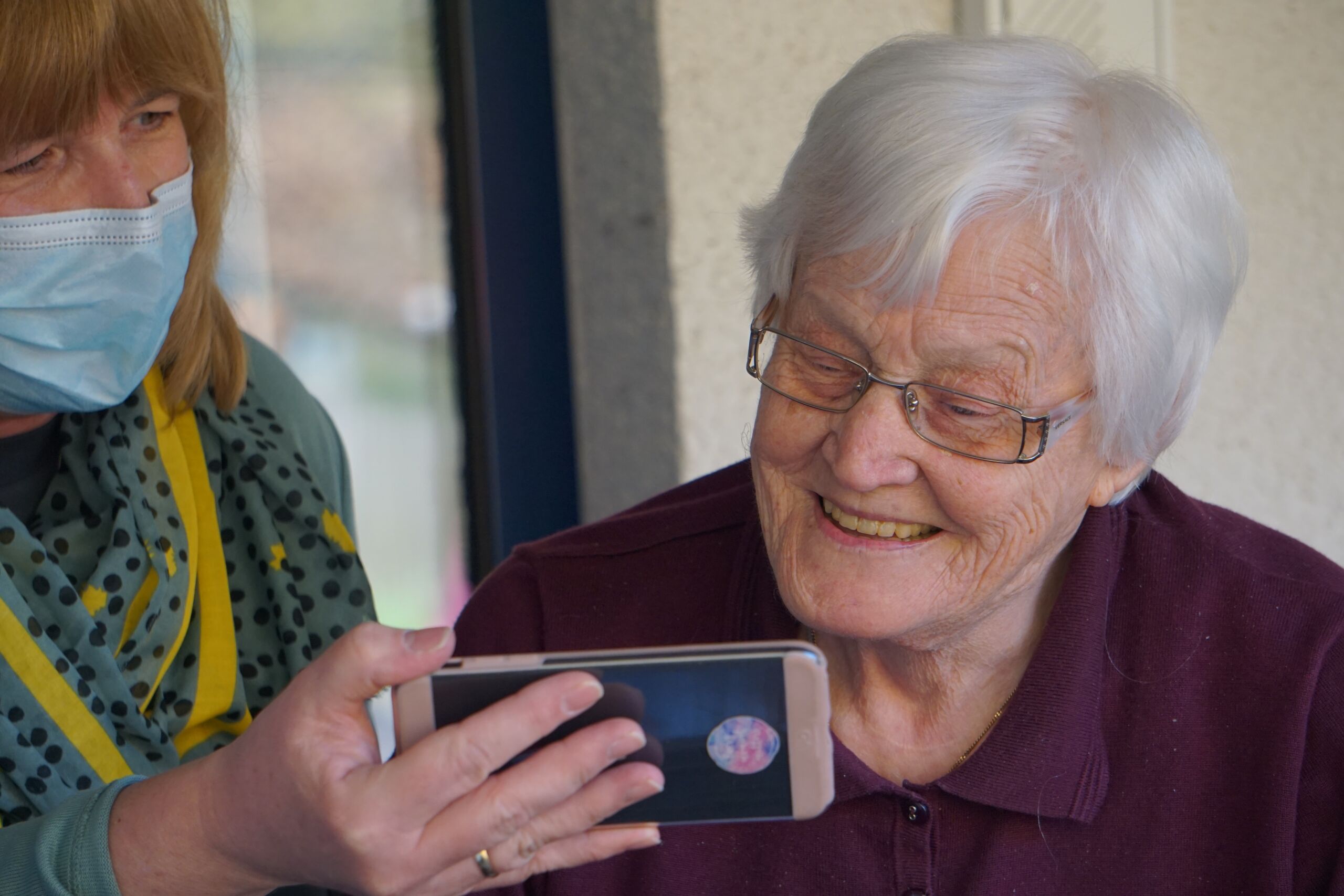 Senior living associate and resident Senior living associate and resident