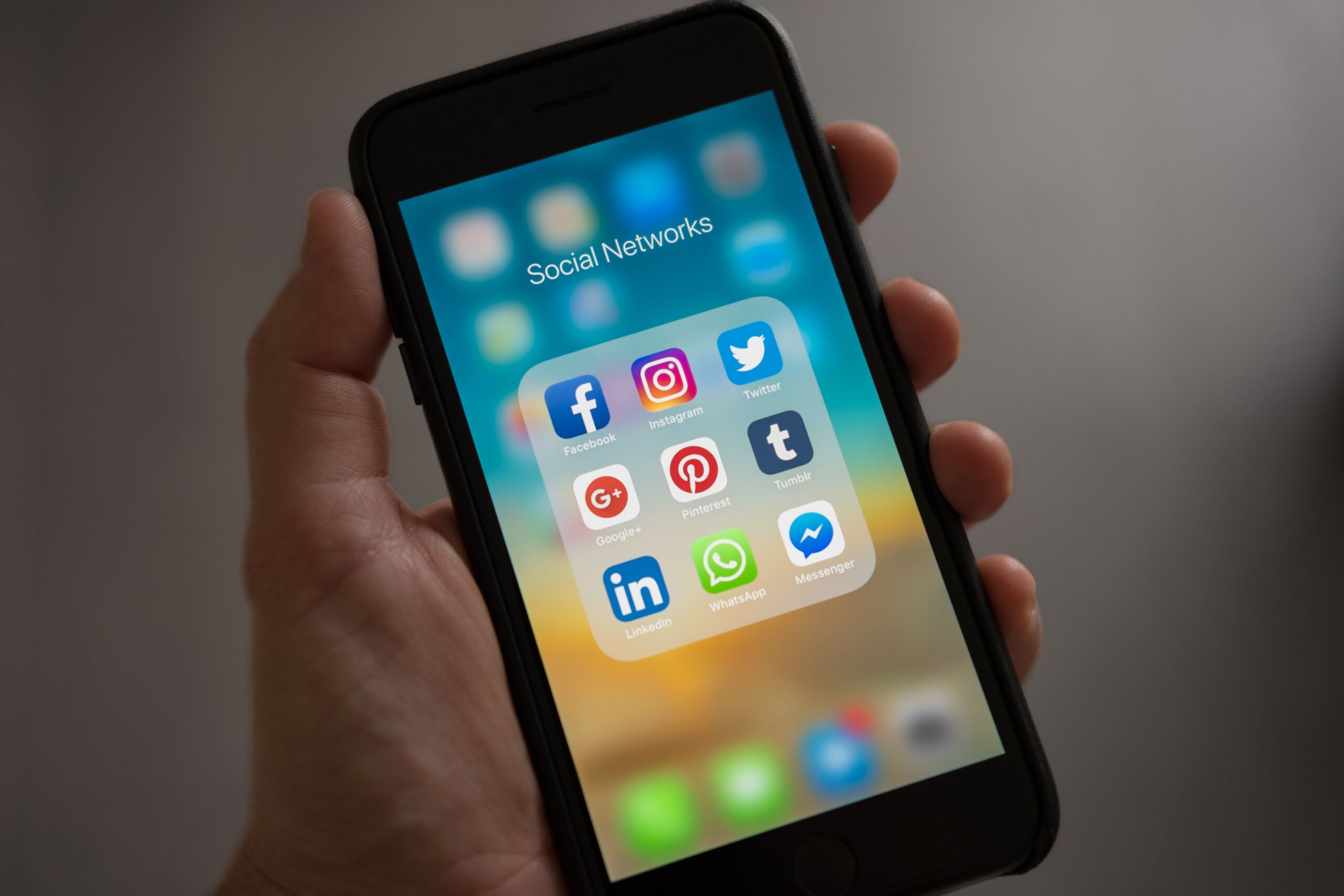 BBB-SocialUpdates A phone displaying social media apps